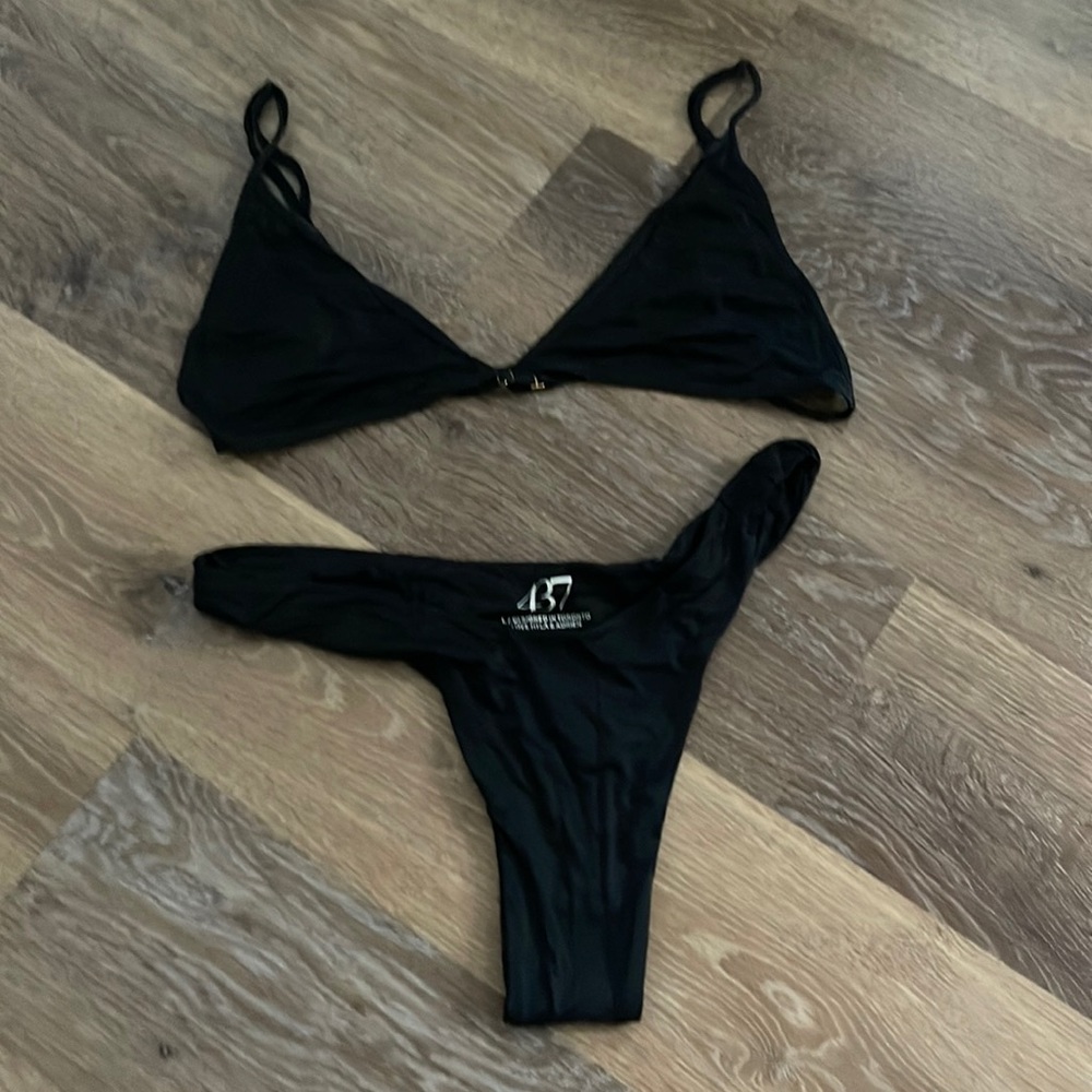 437 swim, black top and black bottoms.